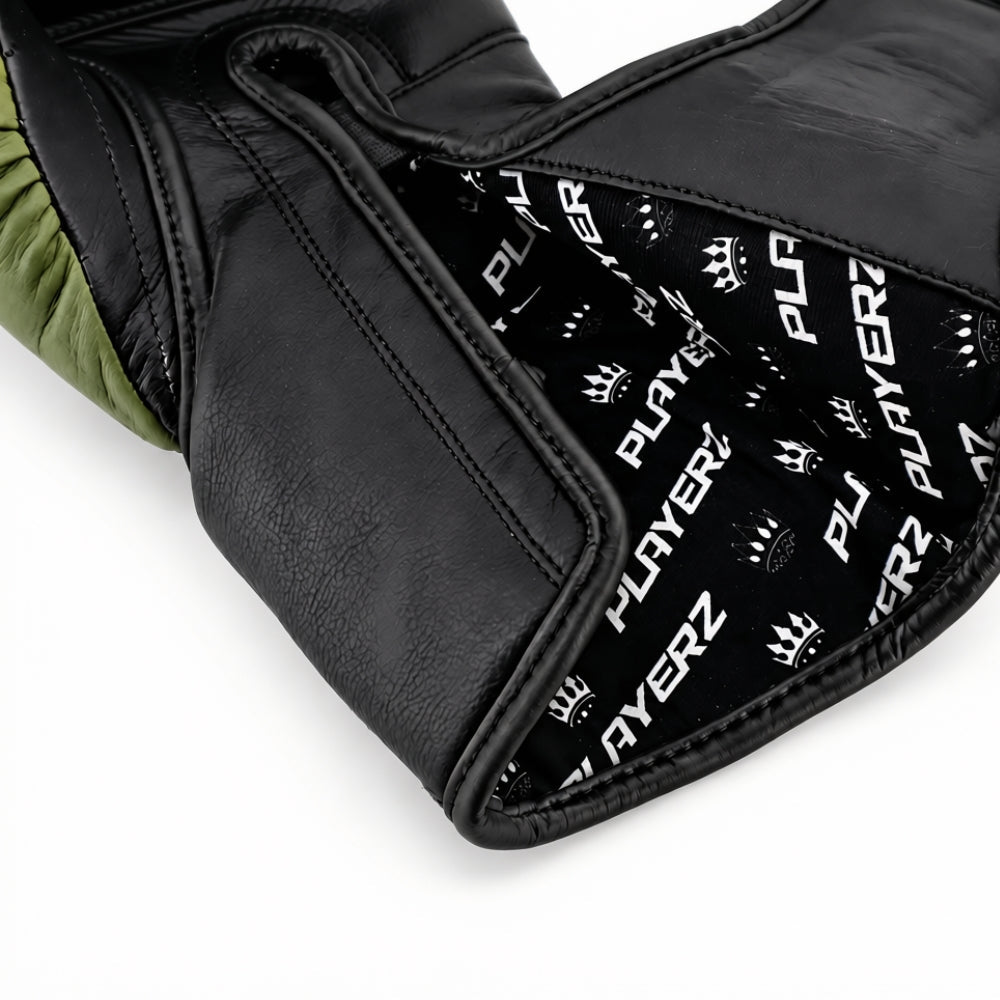 Close-up of black ProTech boxing glove palm with stitched panels and textured edge